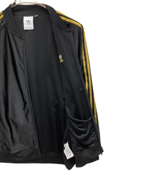 adidas（アディダス）adidas (アディダス) SSTトラックトップ ブラック×ゴールド サイズ:XLの古着・服飾アイテム