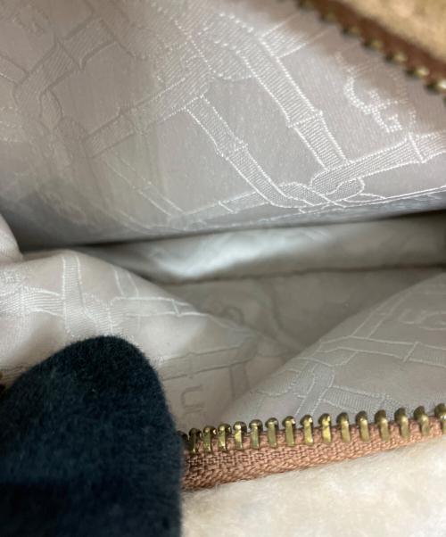 UGG（アグ）UGG (アグ) スウェードリュック ブラウン×ホワイトの古着・服飾アイテム