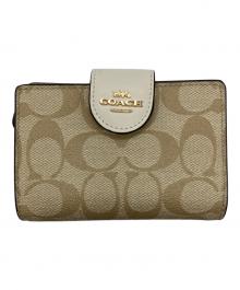 COACH（コーチ）の古着「ミディアム コーナー ジップ ウォレット・シグネチャー キャンバス」｜ベージュ×ホワイト