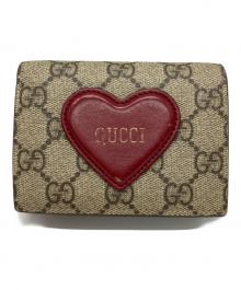 GUCCI（グッチ）の古着「コンパクトウォレット」｜ベージュ