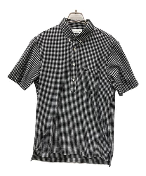 LACOSTE（ラコステ）LACOSTE (ラコステ) クールマックスブレンドジャガード半袖ポロシャツ ブラック×ホワイト サイズ:US Mの古着・服飾アイテム