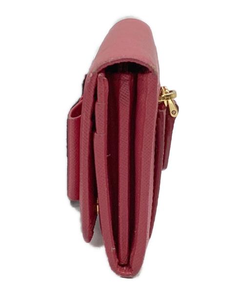 PRADA（プラダ）PRADA (プラダ) カードケース付リボン二つ折り長財布 SAFFIANO FIOCCOの古着・服飾アイテム