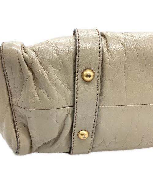 MIU MIU（ミュウミュウ）MIU MIU (ミュウミュウ) ヴィッテロリュックス アイボリーの古着・服飾アイテム