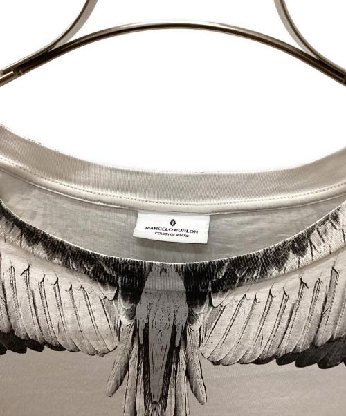 MARCELO BURLON（マルセロバーロン）MARCELO BURLON (マルセロバーロン) 半袖Tシャツ ホワイト×ブラック サイズ:Mの古着・服飾アイテム