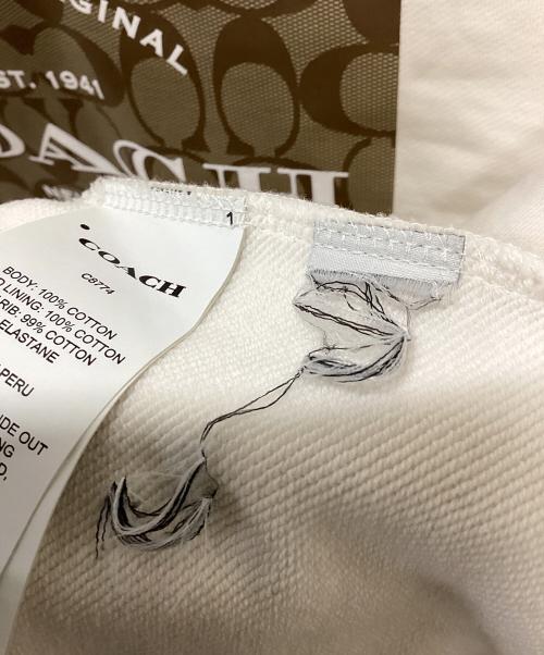 COACH（コーチ）COACH (コーチ) シグネチャーフーディー ホワイト サイズ:LARGEの古着・服飾アイテム