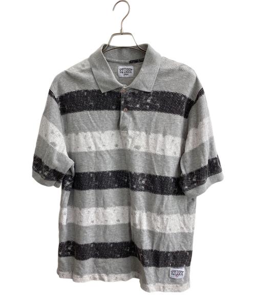 stussy（ステューシー）stussy (ステューシー) ポロシャツ　ペイントボーダー鹿の子ポロシャツ グレー サイズ:Lの古着・服飾アイテム