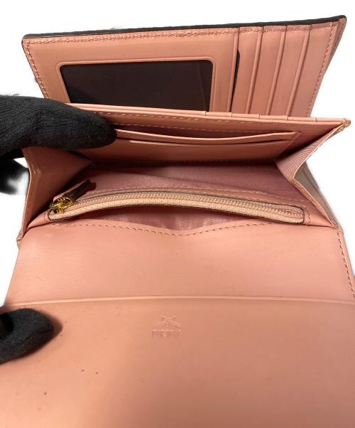 MCM（エムシーエム）MCM (エムシーエム) 3つ折り財布 ベージュの古着・服飾アイテム
