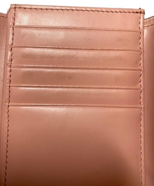 MCM（エムシーエム）MCM (エムシーエム) 3つ折り財布 ベージュの古着・服飾アイテム