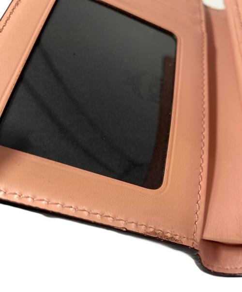 MCM（エムシーエム）MCM (エムシーエム) 3つ折り財布 ベージュの古着・服飾アイテム