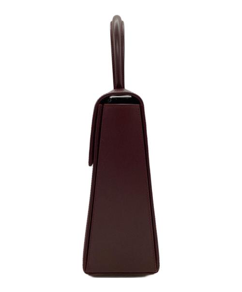 Cartier（カルティエ）Cartier (カルティエ) ターンロックトップハンドルハンドバッグ ボルドーの古着・服飾アイテム