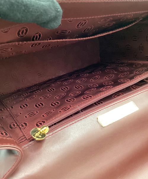 Cartier（カルティエ）Cartier (カルティエ) ターンロックトップハンドルハンドバッグ ボルドーの古着・服飾アイテム