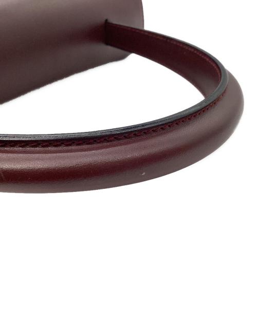 Cartier（カルティエ）Cartier (カルティエ) ターンロックトップハンドルハンドバッグ ボルドーの古着・服飾アイテム