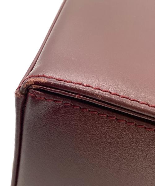 Cartier（カルティエ）Cartier (カルティエ) ターンロックトップハンドルハンドバッグ ボルドーの古着・服飾アイテム