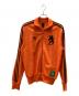 adidas（アディダス）の古着「トラックジャケット」｜オレンジ×ブラック
