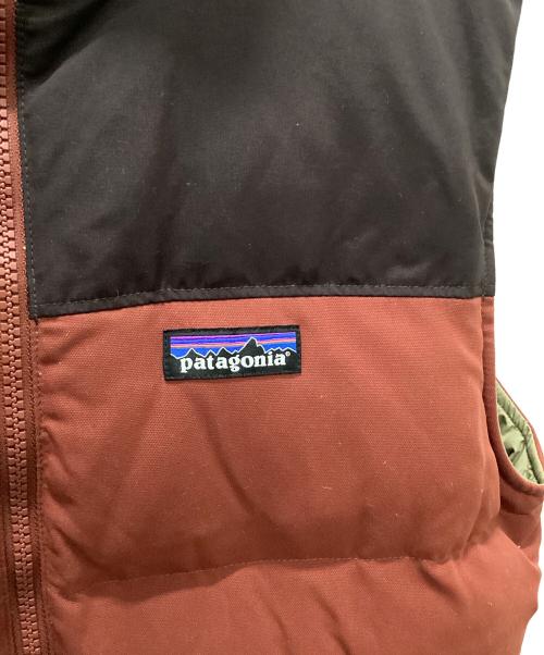Patagonia（パタゴニア）Patagonia (パタゴニア) リバーシブルダウンベスト ブラウン×オレンジ サイズ:Sの古着・服飾アイテム