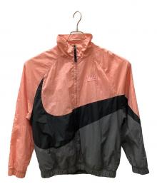 NIKE（ナイキ）の古着「ビッグスウッシュウーブンジャケット」｜グレー×ピンク
