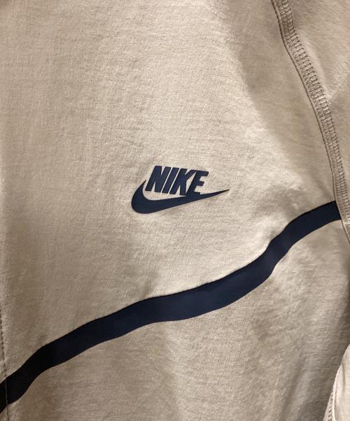 NIKE（ナイキ）NIKE (ナイキ) テックウィンドランナー カーキ×ブラック サイズ:XLの古着・服飾アイテム