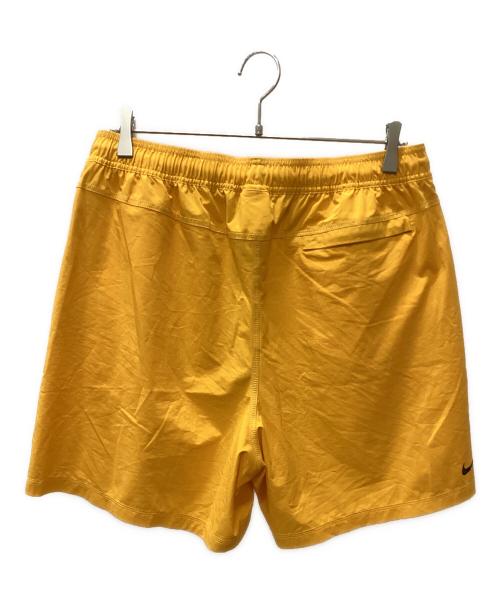 NIKE（ナイキ）NIKE (ナイキ) stussy (ステューシー) NIKE × stussy トレーニングパンツ オレンジ サイズ:Lの古着・服飾アイテム