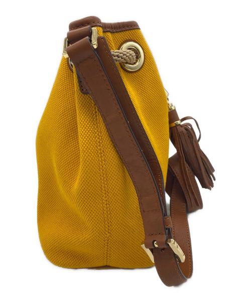 MICHAEL KORS（マイケル・コース）MICHAEL KORS (マイケル・コース) 巾着ショルダーバッグ イエローの古着・服飾アイテム