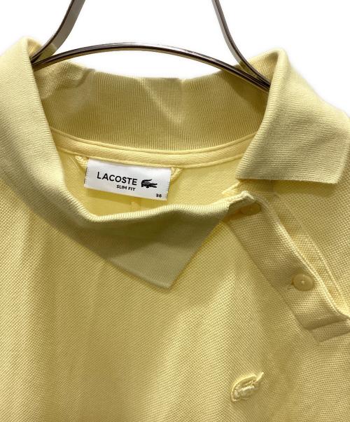 LACOSTE（ラコステ）LACOSTE (ラコステ) 斜めボタンポロドレス イエロー サイズ:38の古着・服飾アイテム