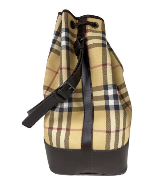 BURBERRY LONDON（バーバリーロンドン）BURBERRY LONDON (バーバリーロンドン) ノバチェック柄巾着ショルダーバッグ ベージュの古着・服飾アイテム