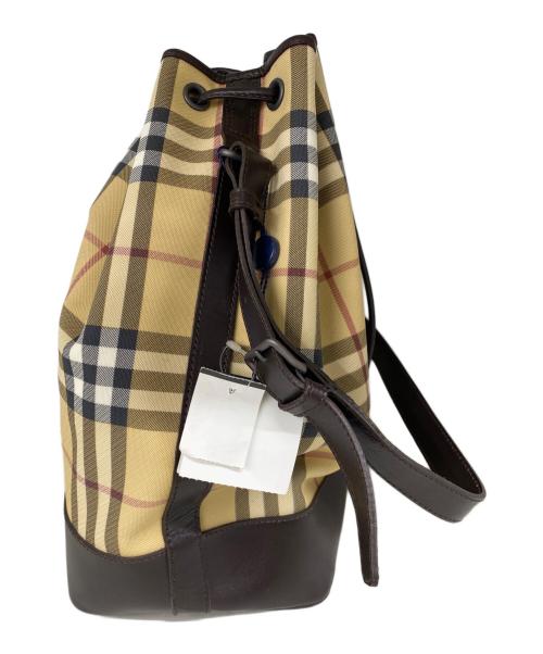 BURBERRY LONDON（バーバリーロンドン）BURBERRY LONDON (バーバリーロンドン) ノバチェック柄巾着ショルダーバッグ ベージュの古着・服飾アイテム