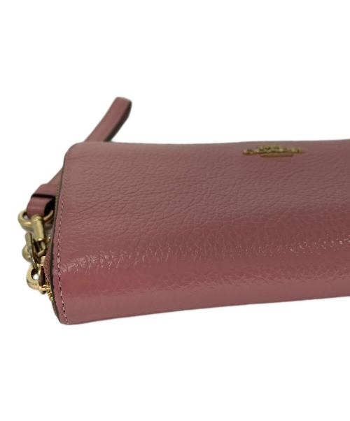 COACH（コーチ）COACH (コーチ) ラウンドファスナー長財布 ピンクの古着・服飾アイテム