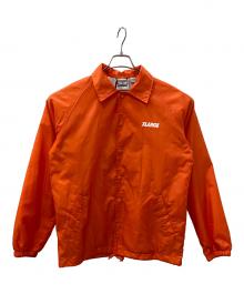 X-LARGE×Cardinal（エクストララージ×カーディナル）の古着「コーチジャケット」｜オレンジ