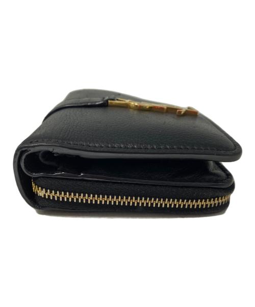 Saint Laurent Paris（サンローランパリ）Saint Laurent Paris (サンローランパリ) ラージジップウォレット “YSL ライン” ブラックの古着・服飾アイテム