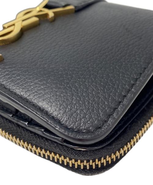 Saint Laurent Paris（サンローランパリ）Saint Laurent Paris (サンローランパリ) ラージジップウォレット “YSL ライン” ブラックの古着・服飾アイテム