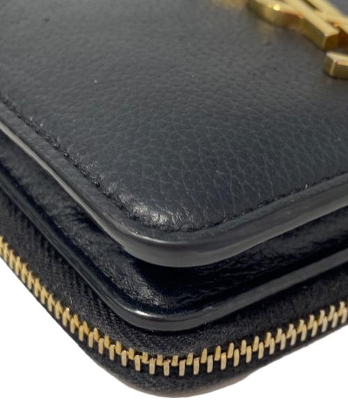 Saint Laurent Paris（サンローランパリ）Saint Laurent Paris (サンローランパリ) ラージジップウォレット “YSL ライン” ブラックの古着・服飾アイテム