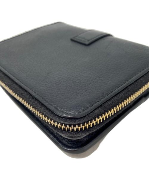 Saint Laurent Paris（サンローランパリ）Saint Laurent Paris (サンローランパリ) ラージジップウォレット “YSL ライン” ブラックの古着・服飾アイテム