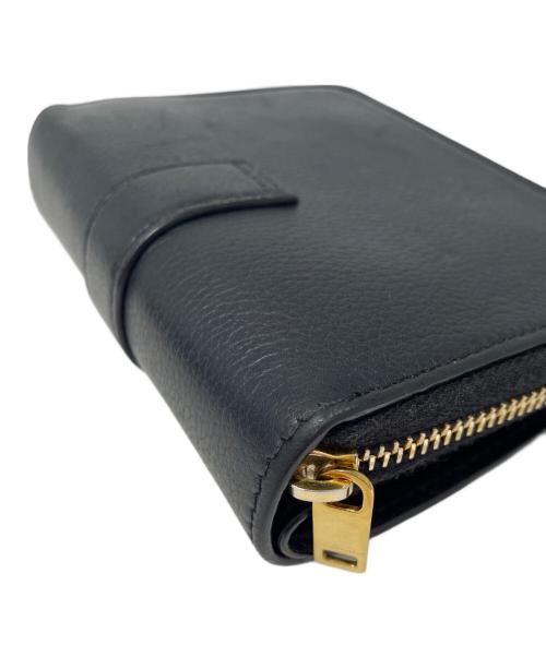 Saint Laurent Paris（サンローランパリ）Saint Laurent Paris (サンローランパリ) ラージジップウォレット “YSL ライン” ブラックの古着・服飾アイテム
