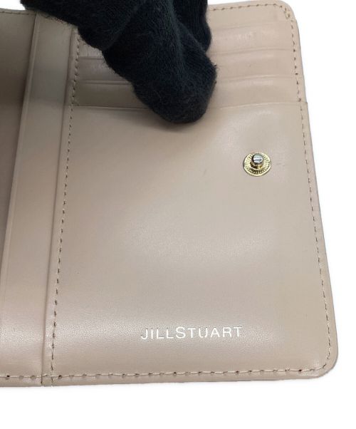 JILL STUART（ジルスチュアート）JILL STUART (ジルスチュアート) 2つ折り財布 ピンク×レッドの古着・服飾アイテム