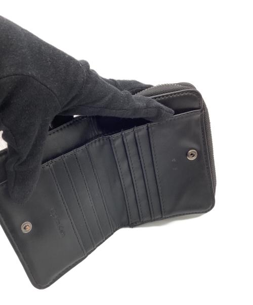 Calvin Klein（カルバンクライン）Calvin Klein (カルバンクライン) キルティング2つ折り財布 ブラックの古着・服飾アイテム