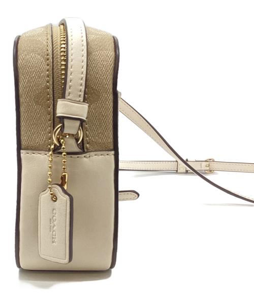 COACH（コーチ）COACH (コーチ) ミニカメラバッグ/シグネチャー キャンバス ベージュの古着・服飾アイテム