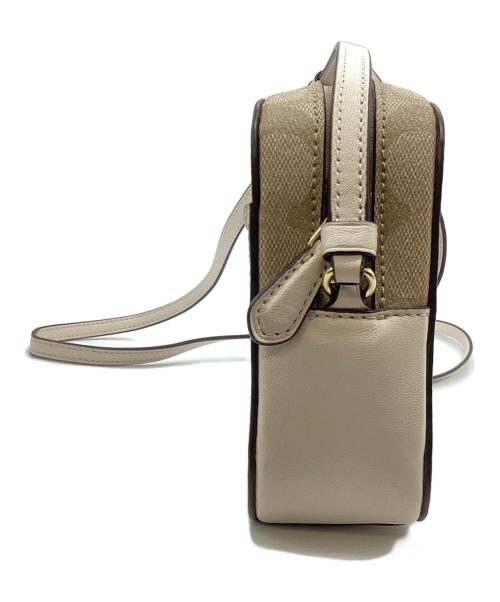COACH（コーチ）COACH (コーチ) ミニカメラバッグ/シグネチャー キャンバス ベージュの古着・服飾アイテム