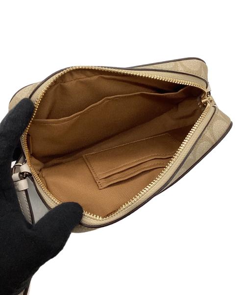 COACH（コーチ）COACH (コーチ) ミニカメラバッグ/シグネチャー キャンバス ベージュの古着・服飾アイテム