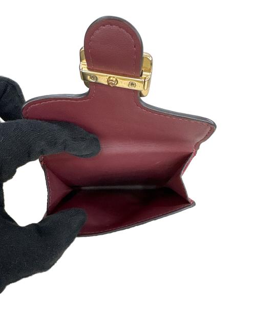 COACH（コーチ）COACH (コーチ) 2つ折り財布 レッドの古着・服飾アイテム