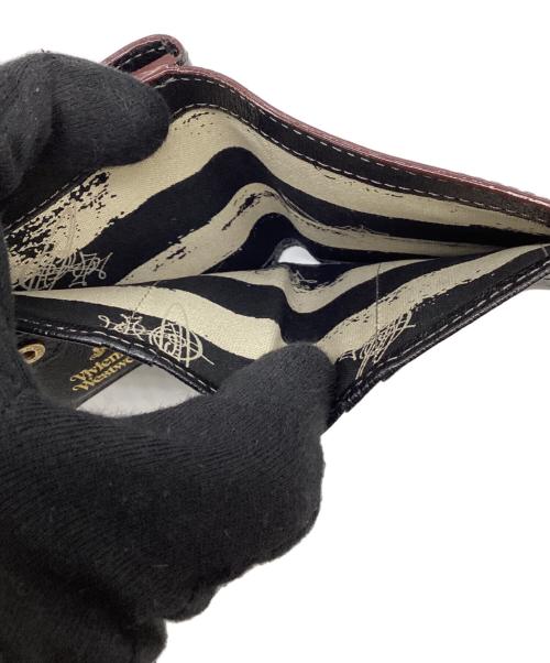 Vivienne Westwood（ヴィヴィアンウエストウッド）Vivienne Westwood (ヴィヴィアンウエストウッド) コンパクトウォレット ブラックの古着・服飾アイテム