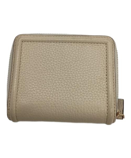 TORY BURCH（トリーバーチ）TORY BURCH (トリーバーチ) 2つ折り財布 ベージュの古着・服飾アイテム