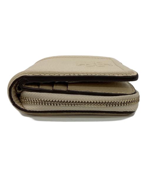 TORY BURCH（トリーバーチ）TORY BURCH (トリーバーチ) 2つ折り財布 ベージュの古着・服飾アイテム