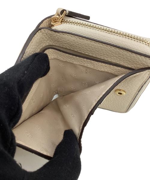 TORY BURCH（トリーバーチ）TORY BURCH (トリーバーチ) 2つ折り財布 ベージュの古着・服飾アイテム