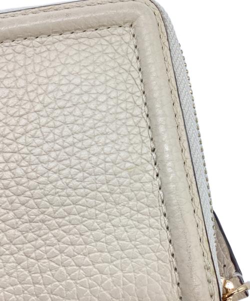 TORY BURCH（トリーバーチ）TORY BURCH (トリーバーチ) 2つ折り財布 ベージュの古着・服飾アイテム