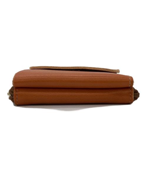 IL BISONTE（イル ビゾンテ）IL BISONTE (イル ビゾンテ) ラウンドジップ スクエアウォレット オレンジの古着・服飾アイテム