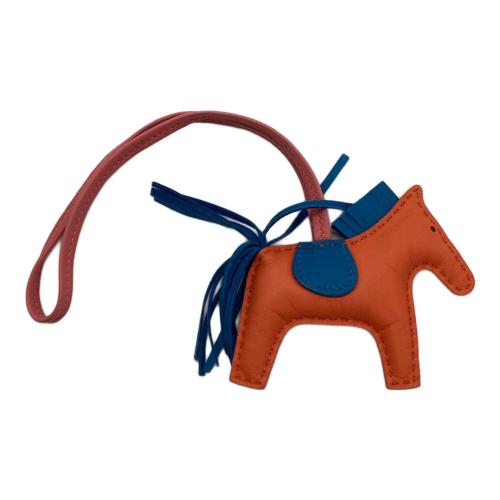 HERMES（エルメス）HERMES (エルメス) ロデオチャームPM オレンジの古着・服飾アイテム