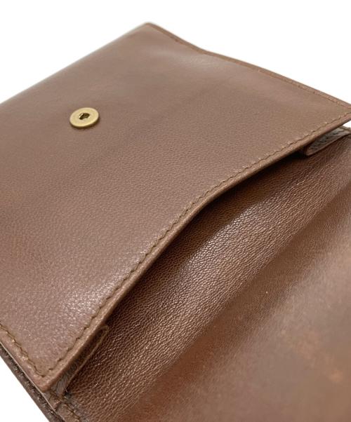 Yves Saint Laurent（イヴサンローラン）Yves Saint Laurent (イヴサンローラン) 2つ折り財布 ブラウンの古着・服飾アイテム