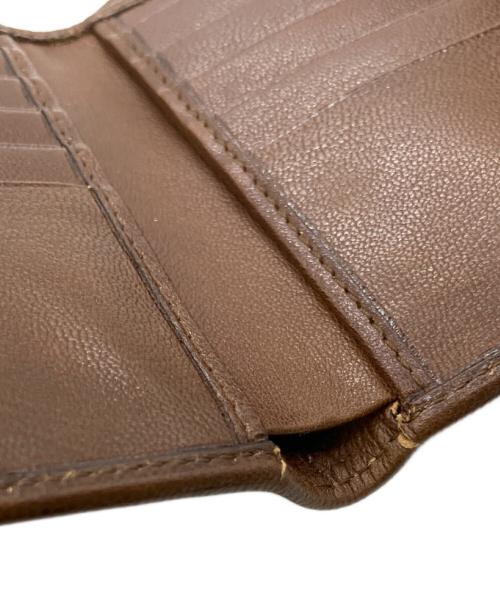 Yves Saint Laurent（イヴサンローラン）Yves Saint Laurent (イヴサンローラン) 2つ折り財布 ブラウンの古着・服飾アイテム