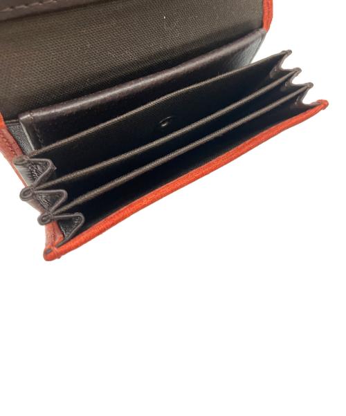 エムピウ m+（エムピウ）エムピウ m+ (エムピウ) 2つ折り財布 レッドの古着・服飾アイテム