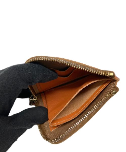 IL BISONTE（イル ビゾンテ）IL BISONTE (イル ビゾンテ) 2つ折り財布 オレンジの古着・服飾アイテム